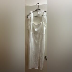 Lulus white midi dress with bows size medium. Worn once for rehearsal dinner.